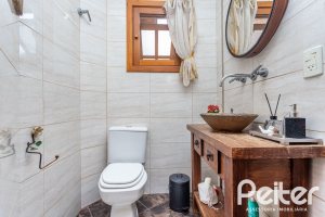 Casa em Condomínio à venda com 560m², 5 dormitórios, 2 suítes, 5 vagas, no bairro Campo Novo em Porto Alegre