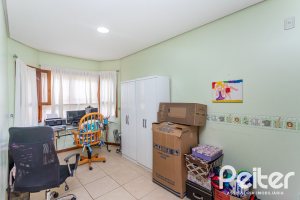 Casa em Condomínio à venda com 560m², 5 dormitórios, 2 suítes, 5 vagas, no bairro Campo Novo em Porto Alegre