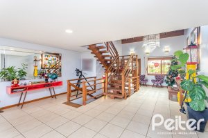 Casa em Condomínio à venda com 560m², 5 dormitórios, 2 suítes, 5 vagas, no bairro Campo Novo em Porto Alegre