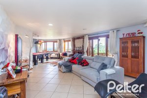 Casa em Condomínio à venda com 560m², 5 dormitórios, 2 suítes, 5 vagas, no bairro Campo Novo em Porto Alegre