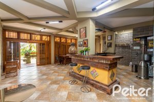 Casa em Condomínio à venda com 560m², 5 dormitórios, 2 suítes, 5 vagas, no bairro Campo Novo em Porto Alegre