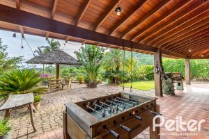 Casa em Condomínio à venda com 560m², 5 dormitórios, 2 suítes, 5 vagas, no bairro Campo Novo em Porto Alegre