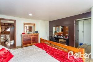 Casa em Condomínio à venda com 560m², 5 dormitórios, 2 suítes, 5 vagas, no bairro Campo Novo em Porto Alegre