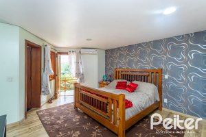 Casa em Condomínio à venda com 560m², 5 dormitórios, 2 suítes, 5 vagas, no bairro Campo Novo em Porto Alegre