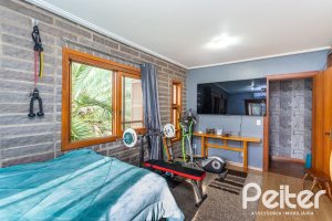 Casa em Condomínio à venda com 560m², 5 dormitórios, 2 suítes, 5 vagas, no bairro Campo Novo em Porto Alegre