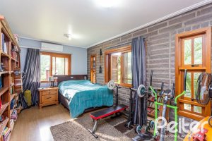 Casa em Condomínio à venda com 560m², 5 dormitórios, 2 suítes, 5 vagas, no bairro Campo Novo em Porto Alegre