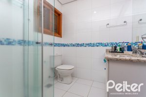 Casa em Condomínio à venda com 560m², 5 dormitórios, 2 suítes, 5 vagas, no bairro Campo Novo em Porto Alegre