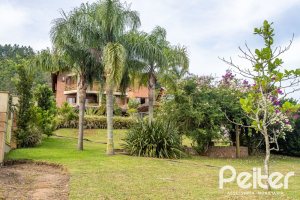 Casa em Condomínio à venda com 560m², 5 dormitórios, 2 suítes, 5 vagas, no bairro Campo Novo em Porto Alegre