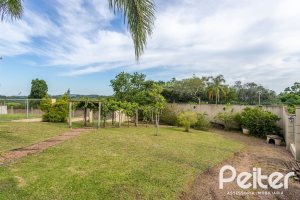 Casa em Condomínio à venda com 560m², 5 dormitórios, 2 suítes, 5 vagas, no bairro Campo Novo em Porto Alegre