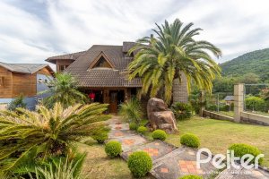 Casa em Condomínio à venda com 560m², 5 dormitórios, 2 suítes, 5 vagas, no bairro Campo Novo em Porto Alegre