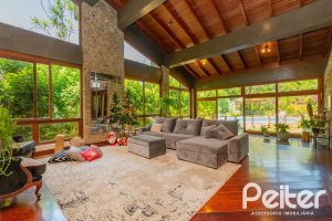 Casa em Condomínio à venda com 600m², 4 dormitórios, 2 suítes, 5 vagas, no bairro Cavalhada em PORTO ALEGRE