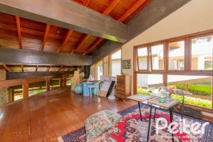 Casa em Condomínio à venda com 600m², 4 dormitórios, 2 suítes, 5 vagas, no bairro Cavalhada em PORTO ALEGRE