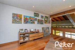 Casa em Condomínio à venda com 600m², 4 dormitórios, 2 suítes, 5 vagas, no bairro Cavalhada em PORTO ALEGRE