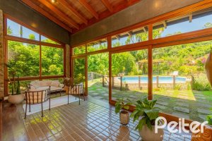 Casa em Condomínio à venda com 600m², 4 dormitórios, 2 suítes, 5 vagas, no bairro Cavalhada em PORTO ALEGRE