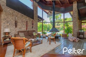 Casa em Condomínio à venda com 600m², 4 dormitórios, 2 suítes, 5 vagas, no bairro Cavalhada em PORTO ALEGRE