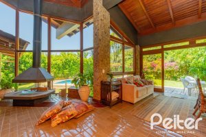 Casa em Condomínio à venda com 600m², 4 dormitórios, 2 suítes, 5 vagas, no bairro Cavalhada em PORTO ALEGRE