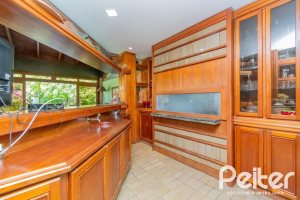 Casa em Condomínio à venda com 600m², 4 dormitórios, 2 suítes, 5 vagas, no bairro Cavalhada em PORTO ALEGRE