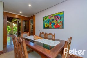 Casa em Condomínio à venda com 600m², 4 dormitórios, 2 suítes, 5 vagas, no bairro Cavalhada em PORTO ALEGRE