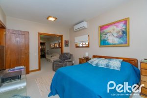 Casa em Condomínio à venda com 600m², 4 dormitórios, 2 suítes, 5 vagas, no bairro Cavalhada em PORTO ALEGRE