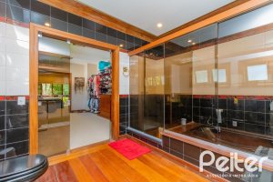 Casa em Condomínio à venda com 600m², 4 dormitórios, 2 suítes, 5 vagas, no bairro Cavalhada em PORTO ALEGRE