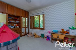 Casa em Condomínio à venda com 600m², 4 dormitórios, 2 suítes, 5 vagas, no bairro Cavalhada em PORTO ALEGRE