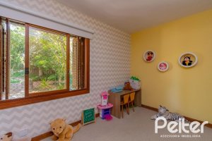 Casa em Condomínio à venda com 600m², 4 dormitórios, 2 suítes, 5 vagas, no bairro Cavalhada em PORTO ALEGRE