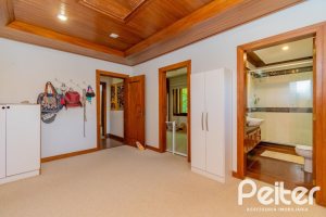 Casa em Condomínio à venda com 600m², 4 dormitórios, 2 suítes, 5 vagas, no bairro Cavalhada em PORTO ALEGRE