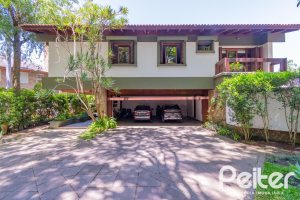 Casa em Condomínio à venda com 600m², 4 dormitórios, 2 suítes, 5 vagas, no bairro Cavalhada em PORTO ALEGRE