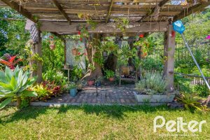 Casa em Condomínio à venda com 600m², 4 dormitórios, 2 suítes, 5 vagas, no bairro Cavalhada em PORTO ALEGRE