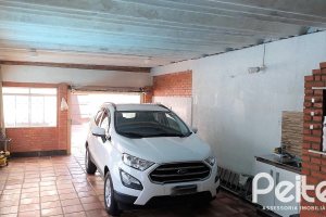 Casa à venda com 160m², 3 dormitórios, 1 suíte, 5 vagas, no bairro Nonoai em Porto Alegre