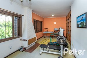 Casa à venda com 600m², 6 dormitórios, 3 suítes, 5 vagas, no bairro Tristeza em Porto Alegre