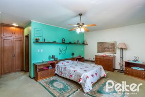 Casa à venda com 600m², 6 dormitórios, 3 suítes, 5 vagas, no bairro Tristeza em Porto Alegre