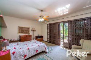 Casa à venda com 600m², 6 dormitórios, 3 suítes, 5 vagas, no bairro Tristeza em Porto Alegre