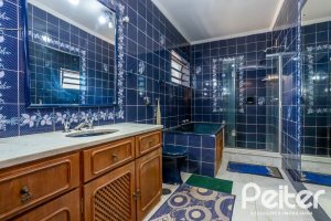 Casa à venda com 600m², 6 dormitórios, 3 suítes, 5 vagas, no bairro Tristeza em Porto Alegre