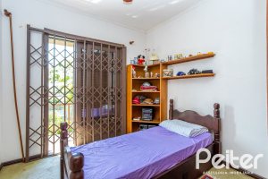 Casa à venda com 600m², 6 dormitórios, 3 suítes, 5 vagas, no bairro Tristeza em Porto Alegre