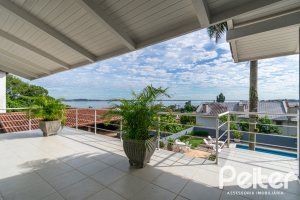 Casa à venda com 312m², 5 dormitórios, 5 suítes, 5 vagas, no bairro Vila Conceição em Porto Alegre