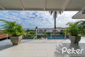 Casa à venda com 312m², 5 dormitórios, 5 suítes, 5 vagas, no bairro Vila Conceição em Porto Alegre