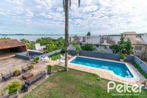 Casa à venda com 312m², 5 dormitórios, 5 suítes, 5 vagas, no bairro Vila Conceição em Porto Alegre