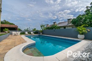 Casa à venda com 312m², 5 dormitórios, 5 suítes, 5 vagas, no bairro Vila Conceição em Porto Alegre