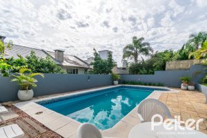 Casa à venda com 312m², 5 dormitórios, 5 suítes, 5 vagas, no bairro Vila Conceição em Porto Alegre