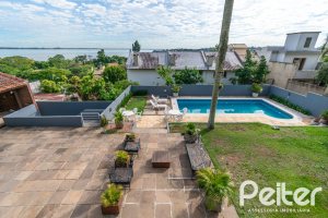 Casa à venda com 312m², 5 dormitórios, 5 suítes, 5 vagas, no bairro Vila Conceição em Porto Alegre