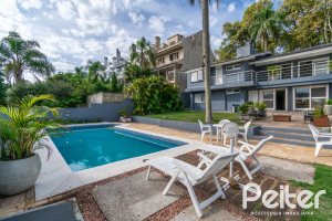 Casa à venda com 312m², 5 dormitórios, 5 suítes, 5 vagas, no bairro Vila Conceição em Porto Alegre