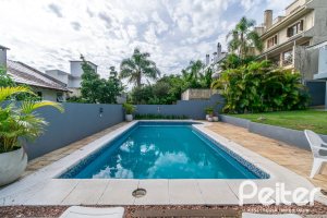 Casa à venda com 312m², 5 dormitórios, 5 suítes, 5 vagas, no bairro Vila Conceição em Porto Alegre