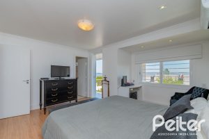 Casa à venda com 312m², 5 dormitórios, 5 suítes, 5 vagas, no bairro Vila Conceição em Porto Alegre