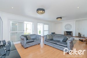 Casa à venda com 312m², 5 dormitórios, 5 suítes, 5 vagas, no bairro Vila Conceição em Porto Alegre