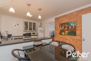 Casa à venda com 312m², 5 dormitórios, 5 suítes, 5 vagas, no bairro Vila Conceição em Porto Alegre