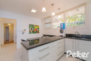 Casa à venda com 312m², 5 dormitórios, 5 suítes, 5 vagas, no bairro Vila Conceição em Porto Alegre