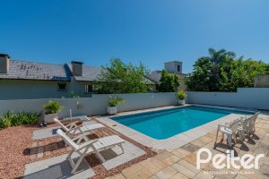 Casa à venda com 312m², 5 dormitórios, 5 suítes, 5 vagas, no bairro Vila Conceição em Porto Alegre