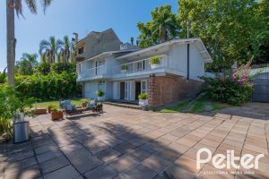 Casa à venda com 312m², 5 dormitórios, 5 suítes, 5 vagas, no bairro Vila Conceição em Porto Alegre