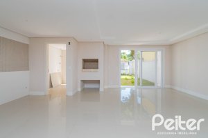 Casa em Condomínio à venda com 293m², 3 dormitórios, 3 suítes, 3 vagas, no bairro Tristeza em Porto Alegre